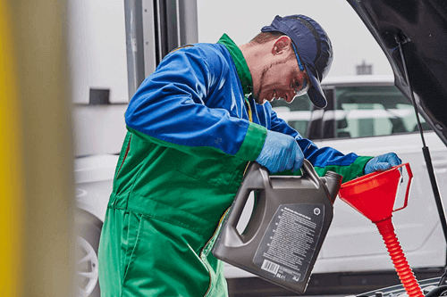 ATS Euromaster technician carrying out oil change service